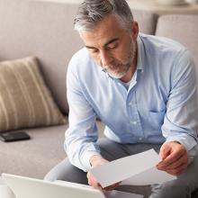 Man reading letter